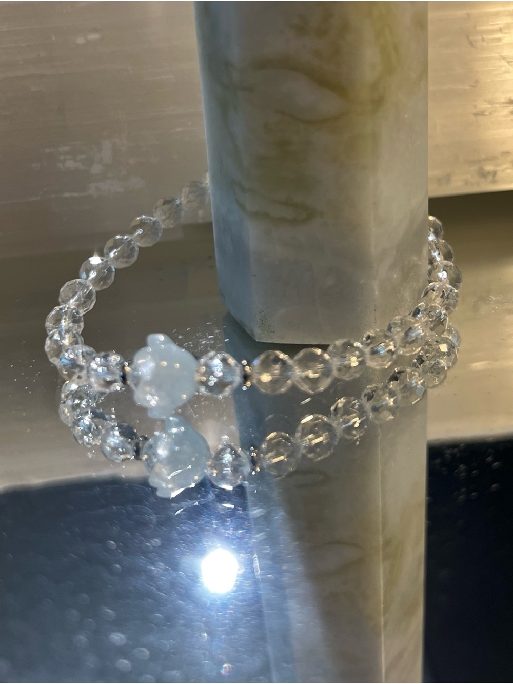Clear Crystal Bead Stretch Bracelet with Pale Blue Flower Accent